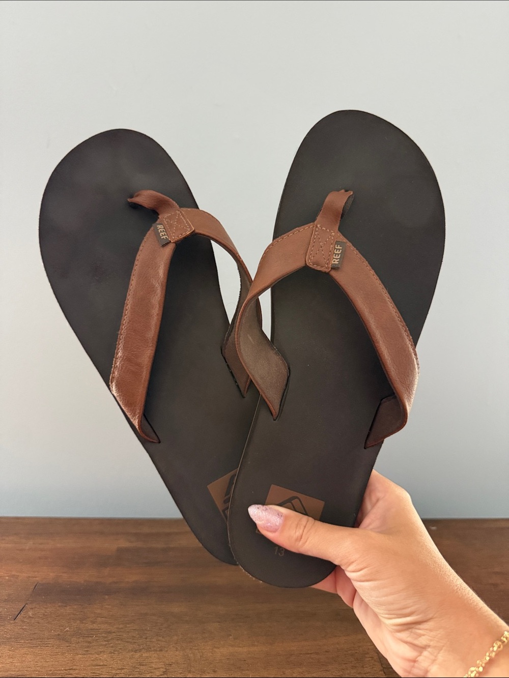 Reef Men's Brown Leather Strap Flip-Flops with Black Footbed